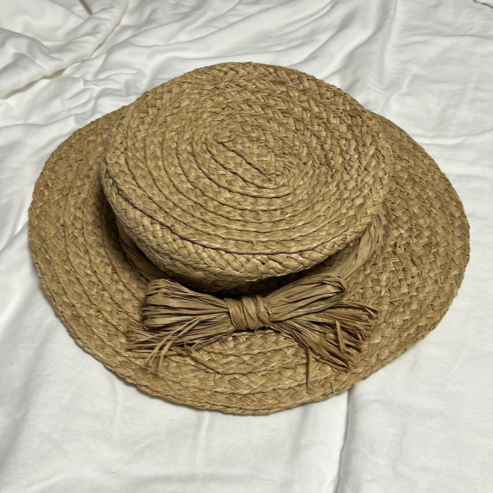 Liz Claiborne, straw hat.